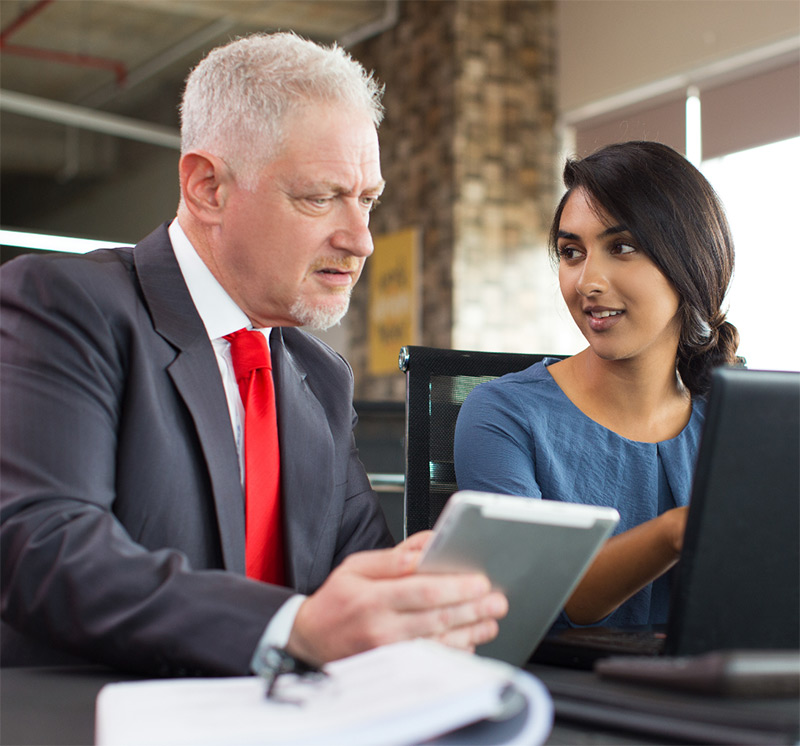 Image of a man and a woman working collaboratively to illustrate process