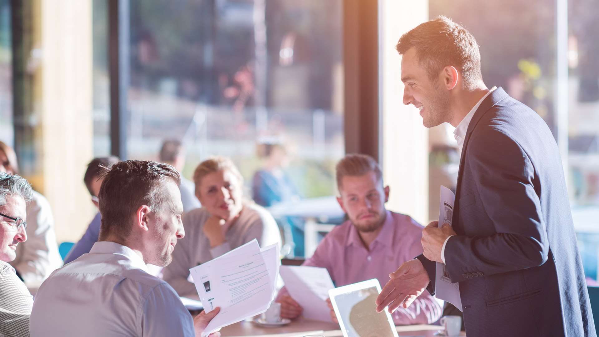 Image of a group of people discussing obsolescence management