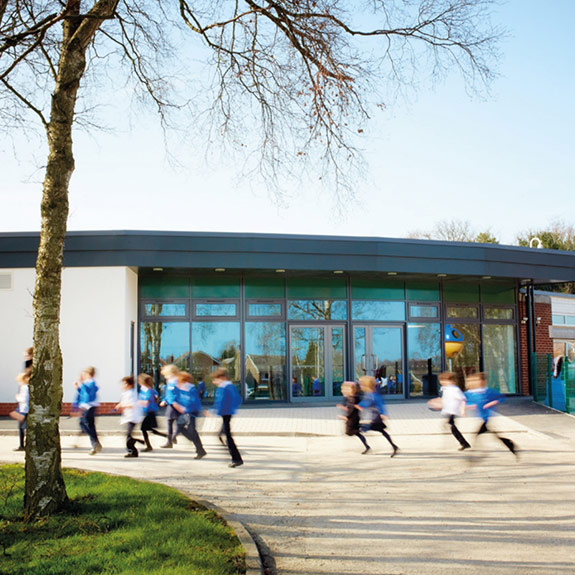 primary school children in a playground