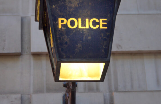 Police lamp on outside of building