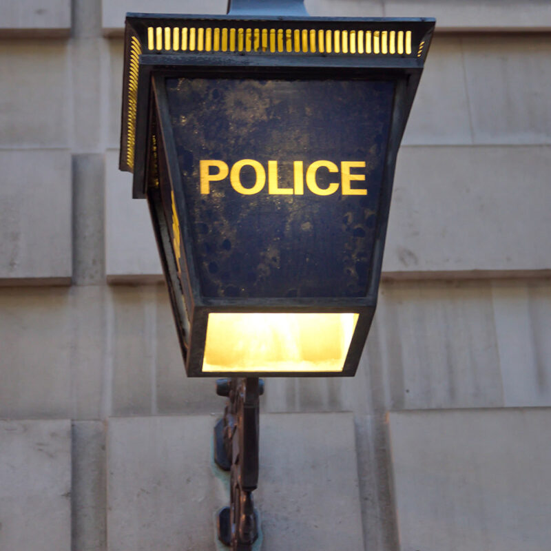 Police lamp on outside of building